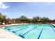 Resort-style pool area with ample seating and landscaping at 35322 N 27Th Ln, Phoenix, AZ 85086