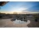 Backyard pool with beautiful desert views perfect for relaxation and entertainment at 35322 N 27Th Ln, Phoenix, AZ 85086