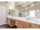 Primary bathroom with double sinks, large mirror, and tile floors at 3751 S Vista Pl, Chandler, AZ 85248