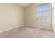 Bedroom features plush carpet, a window, and a closet at 3751 S Vista Pl, Chandler, AZ 85248