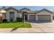 Charming single-story home featuring a well-maintained lawn and a spacious two-car garage at 3751 S Vista Pl, Chandler, AZ 85248