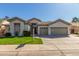 Charming single-story home featuring a well-maintained lawn and a spacious two-car garage at 3751 S Vista Pl, Chandler, AZ 85248