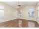 Bright living room with vaulted ceilings, wood-look floors, and many large windows for natural light at 3751 S Vista Pl, Chandler, AZ 85248