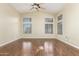 Inviting living room features vaulted ceilings, wood-look floors, and a ceiling fan for added comfort at 3751 S Vista Pl, Chandler, AZ 85248