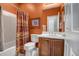 Bathroom with a shower-tub combo and a single sink vanity at 41012 N Noble Hawk Way, Anthem, AZ 85086