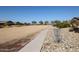 Enjoy a community disc golf course with walking paths and desert landscaping at 4107 W Eli Dr, San Tan Valley, AZ 85144