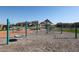 Community playground with modern equipment, a sand base, and an area for children to enjoy outdoor activities at 4107 W Eli Dr, San Tan Valley, AZ 85144