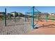 A community playground area with modern blue climbing equipment on a sand and cushioned base for safety at 4107 W Eli Dr, San Tan Valley, AZ 85144