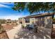 Inviting outdoor patio area with comfortable seating and scenic views, perfect for relaxing or entertaining at 41401 N Maidstone Ct, Anthem, AZ 85086