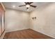 Neutral bedroom features light walls, wood floors, and recessed lighting at 4226 E Jojoba Rd, Phoenix, AZ 85044