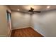 This bedroom features recessed lighting, a ceiling fan, and wood-look flooring at 4226 E Jojoba Rd, Phoenix, AZ 85044