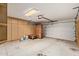 A spacious two-car garage with storage cabinets at 4226 E Jojoba Rd, Phoenix, AZ 85044
