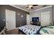 Nicely decorated bedroom with a ceiling fan, muted wall colors, and carpet flooring at 4312 W Olney Ave, Laveen, AZ 85339