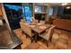 An inviting dining area with granite counters transitions to a large outdoor pool area at 4312 W Olney Ave, Laveen, AZ 85339