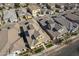 Aerial view of a well-planned residential neighborhood with neat landscaping and diverse architectural styles at 4498 E Bethena St, Gilbert, AZ 85295