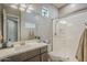 Bathroom featuring a spacious shower, modern fixtures, and stylish design, and a large vanity at 4498 E Bethena St, Gilbert, AZ 85295