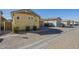 Exterior view of a charming single-Gathering home with a two-car garage and well-manicured landscaping at 4498 E Bethena St, Gilbert, AZ 85295