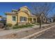 Inviting two-story home featuring desert landscaping and charming front porch at 4498 E Bethena St, Gilbert, AZ 85295