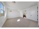 Bright bedroom featuring neutral carpet, white walls, and natural light from windows at 4552 W Willow Run --, San Tan Valley, AZ 85144