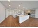 Modern eat-in kitchen featuring an island with sink, quartz countertop, tile backsplash and recessed lighting at 4552 W Willow Run --, San Tan Valley, AZ 85144