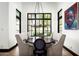 Charming dining room with natural light, an elegant chandelier, and comfortable seating at 5016 E Butler Dr, Paradise Valley, AZ 85253