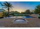 Backyard pool featuring fountains and tranquil landscaping with mountain views in the background at 5016 E Butler Dr, Paradise Valley, AZ 85253