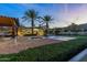 Backyard pool with fountains and tropical landscaping with mountain views in the background at 5016 E Butler Dr, Paradise Valley, AZ 85253