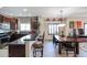 A granite breakfast bar connects the kitchen to the dining room, perfect for casual meals and entertaining guests at 5350 E Deer Valley Dr # 3277, Phoenix, AZ 85054