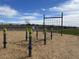 Community playground with a net climb and step obstacles over a wood chip surface for active play at 5515 W Hopi Trl, Laveen, AZ 85339