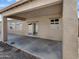 Covered patio area with ample space for outdoor seating and entertaining at 5822 W Huntington Dr, Laveen, AZ 85339