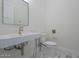 A stylish powder room featuring modern fixtures and finishes at 6378 S 154Th St, Gilbert, AZ 85298