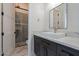 Contemporary bathroom featuring a modern vanity and a glass-enclosed shower at 6378 S 154Th St, Gilbert, AZ 85298