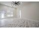 Bedroom featuring tile flooring, neutral wall paint, and a fan at 6378 S 154Th St, Gilbert, AZ 85298