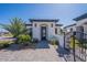 Charming front exterior with paved walkway and wrought-iron gate at 6378 S 154Th St, Gilbert, AZ 85298