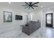 Relaxing living room featuring a comfortable sofa and modern decor at 6378 S 154Th St, Gilbert, AZ 85298