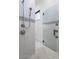 Sleek shower design with decorative mosaic accents and a modern glass door at 6378 S 154Th St, Gilbert, AZ 85298