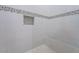 Clean shower design featuring textured white tile, mosaic accents, and a built-in bench at 6378 S 154Th St, Gilbert, AZ 85298