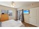 Well-lit bedroom featuring carpet floors and a sliding glass door to a balcony at 7609 E Indian Bend Rd # 2008, Scottsdale, AZ 85250