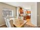 Dining table with view into updated kitchen at 7609 E Indian Bend Rd # 2008, Scottsdale, AZ 85250