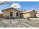 Beautiful desert landscaped home with neutral color scheme and tile roof at 7712 N 54Th Ln, Glendale, AZ 85301