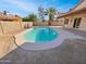 Backyard view of refreshing pool at 8722 W Wilshire Dr, Phoenix, AZ 85037