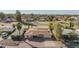 Aerial shot of home with desert landscaping, fenced yard, and great neighborhood amenities at 902 S Saranac Ave, Mesa, AZ 85208