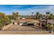 Expansive backyard featuring a cozy outdoor living area, perfect for entertaining and enjoying the serene outdoor space at 902 S Saranac Ave, Mesa, AZ 85208