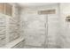 Gorgeous shower with new tile work, shower bench, and overhead shower head at 902 S Saranac Ave, Mesa, AZ 85208