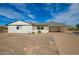 Charming home with a long driveway and decorative carport at 10259 N 102Nd Dr, Sun City, AZ 85351