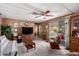 Cozy living room with a ceiling fan, providing a relaxing space for entertainment and Gathering gatherings at 11411 N 91St Ave # 48, Peoria, AZ 85345