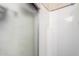 Enclosed shower with translucent glass door and white shower walls at 11411 N 91St Ave # 48, Peoria, AZ 85345