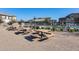 Outdoor picnic area with tables, BBQ, and access to the community pool providing an ideal setting for gatherings at 1255 N Arizona Ave # 1093, Chandler, AZ 85225