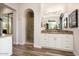 Well-lit bathroom features granite counters, double sinks, and a separate tiled shower at 12663 W Pinnacle Vista Dr, Peoria, AZ 85383