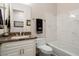 Charming bathroom with granite counters, tiled shower, and modern fixtures at 12663 W Pinnacle Vista Dr, Peoria, AZ 85383
